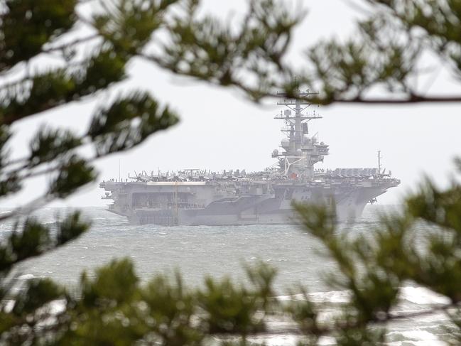 The USS Ronald Reagan cruises past the Sunshine Coast on its way to Brisbane. Picture: Cade Mooney