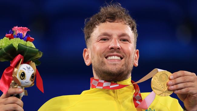 Australia’s Dylan Alcott with his quad singles gold medal at the Tokyo Paralympic Games.