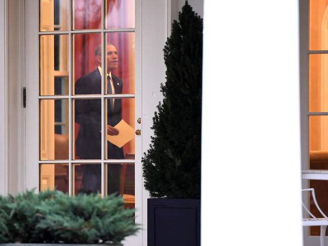 President Barack Obama is seen in the Oval Office at the White House in Washington, DC prior to departing for the last time as president January 20, 2017. Picture: AFP