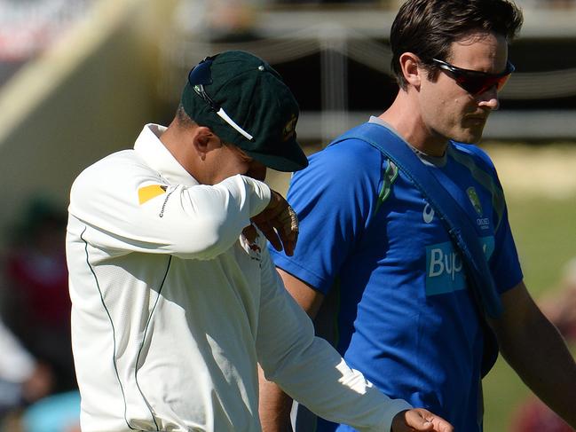 SPORT - Test Cricket. 2nd Test. Day 2. Australia v New Zealand at the WACA. Photo by Daniel Wilkins. PICTURED - Australian fielder Usman Khawaja leaves the field with a suspected hamstring injury