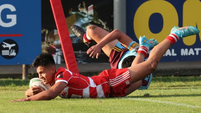 PBC SHS’s Keano Kini scores a try. Picture: Liam Kidston