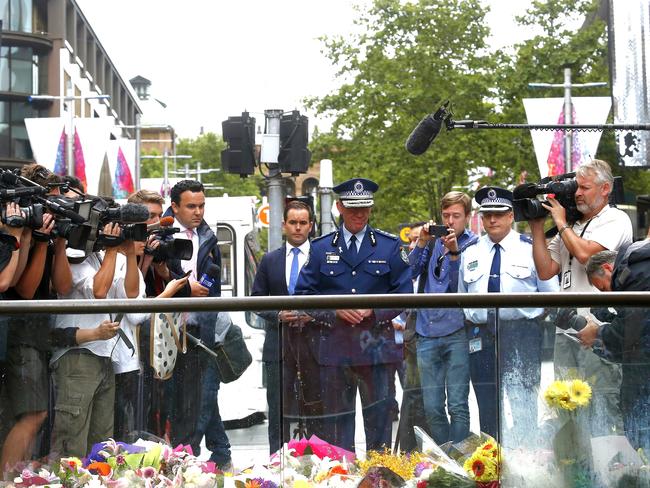 Police Commissioner Andrew Scipione visits the memorial in Martin Place. Picture: Bradley Hunter