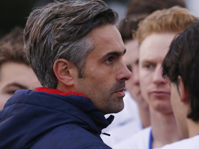 Footscray coach Daniel Giansiracusa at the huddle.