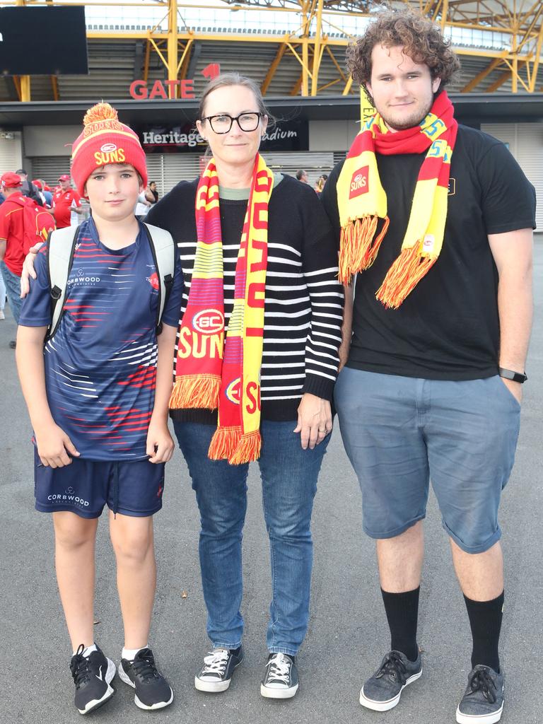 The Gold Coast Suns will host its first AFLW final when they take on the Sydney Swans on Saturday night. Hamish, Rachel and Drew Dunstan. 11 November 2023 Carrara Picture by Richard Gosling