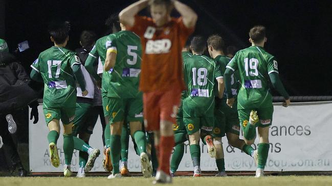 The Greens celebrate an extra time goal during the round of 32 Australia Cup match between Bentleigh Green SC and Broadmeadow Magic at Kingston Heath Soccer Complex on July 21, 2022.(Photo by Jonathan DiMaggio/Getty Images)