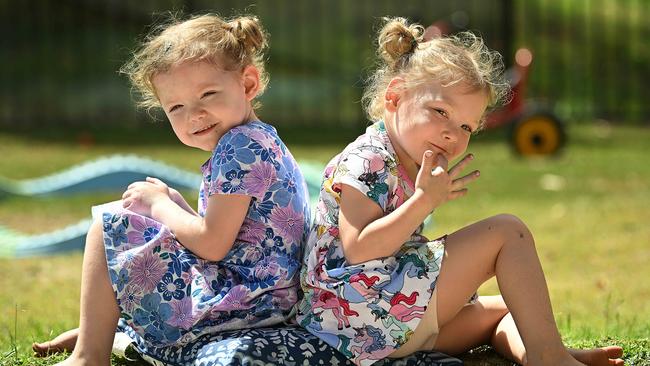 Twins Rose, left, and Rhylee Emmerton-Harvey at the AEIOU Foundation’s early intervention and therapy centre in Bundaberg, Queensland. Picture: Lyndon Mechielsen