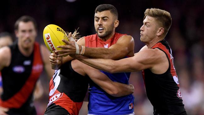 Christian Salem had his left thumb strapped in Sunday’s win over Essendon after injuring it before halftime. Picture: AAP Image