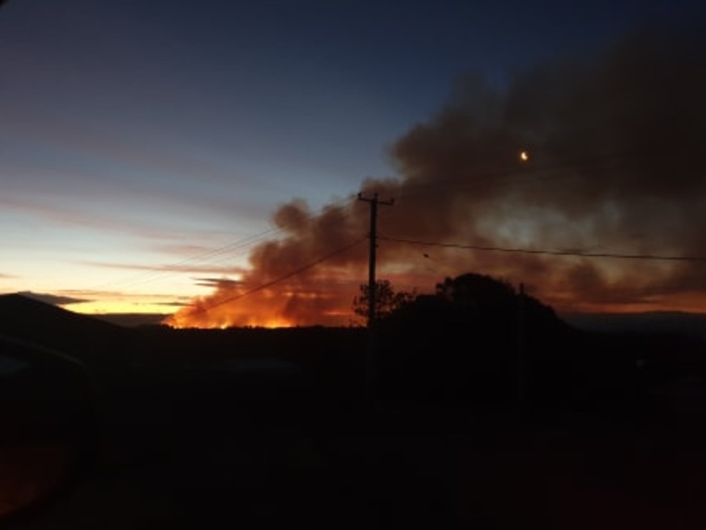 A bushfire at Dolphin Sands is threatening the small coastal town. Picture: TASH HARRIS