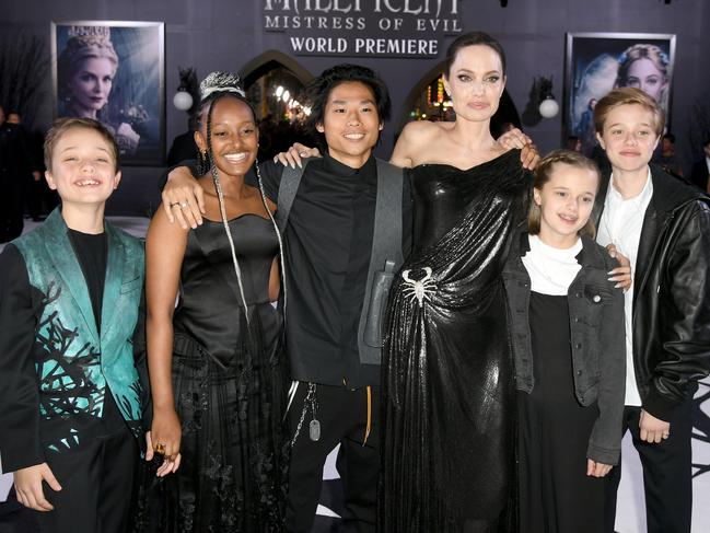 The Pitt-Jolie family: Knox Jolie-Pitt, Zahara Marley Jolie-Pitt, Pax Thien Jolie-Pitt, Angelina Jolie, Vivienne Marcheline Jolie-Pitt, and Shiloh Nouvel Jolie-Pitt in 2019. Picture: Kevin Winter/Getty Images)