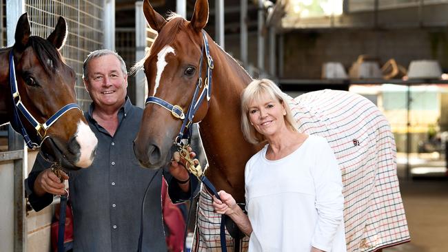 Gordon Richards and his wife Jacqui Richards, with Gytrash between them. Picture: Mark Brake