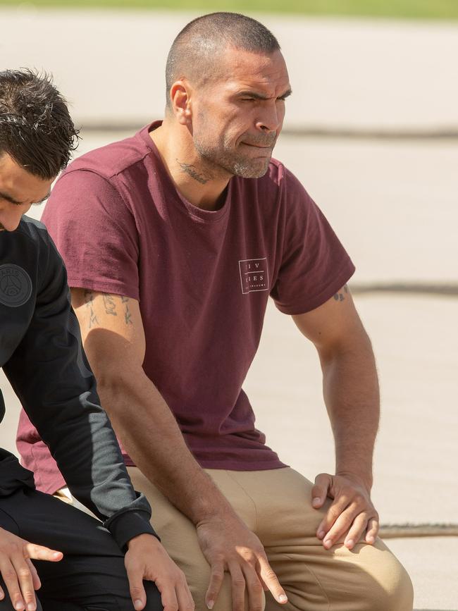 Anthony Mundine joins Muslims for the call to pray at Hagley Park, opposite the Al Noor Mosque, in Christchurch. Picture: AAP Image/SNPA, Martin Hunter