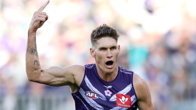 PERTH, AUSTRALIA - JULY 03: Rory Lobb of the Dockers celebrates after scoring a goal during the 2022 AFL Round 16 match between the Fremantle Dockers and the Port Adelaide Power at Optus Stadium on July 03, 2022 in Perth, Australia. (Photo by Will Russell/AFL Photos via Getty Images)