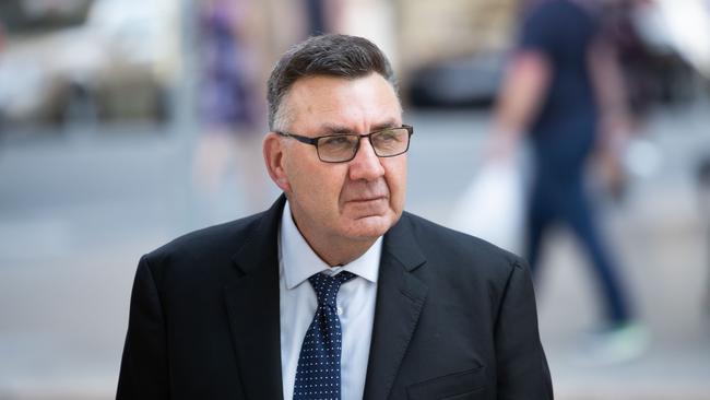 Ex-Mirvac director Adam Moore outside the Brisbane Magistrates Court. Picture: AAP/Glenn Hunt