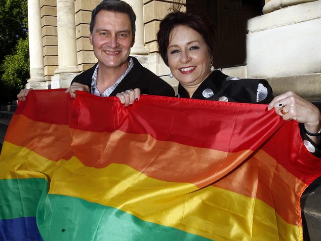 Same-sex marriage supporters ... advocate Rodney Croome and Hobart Lord Mayor Sue Hickey with the rainbow flag at Town Hall. Picture: Kim Eiszele