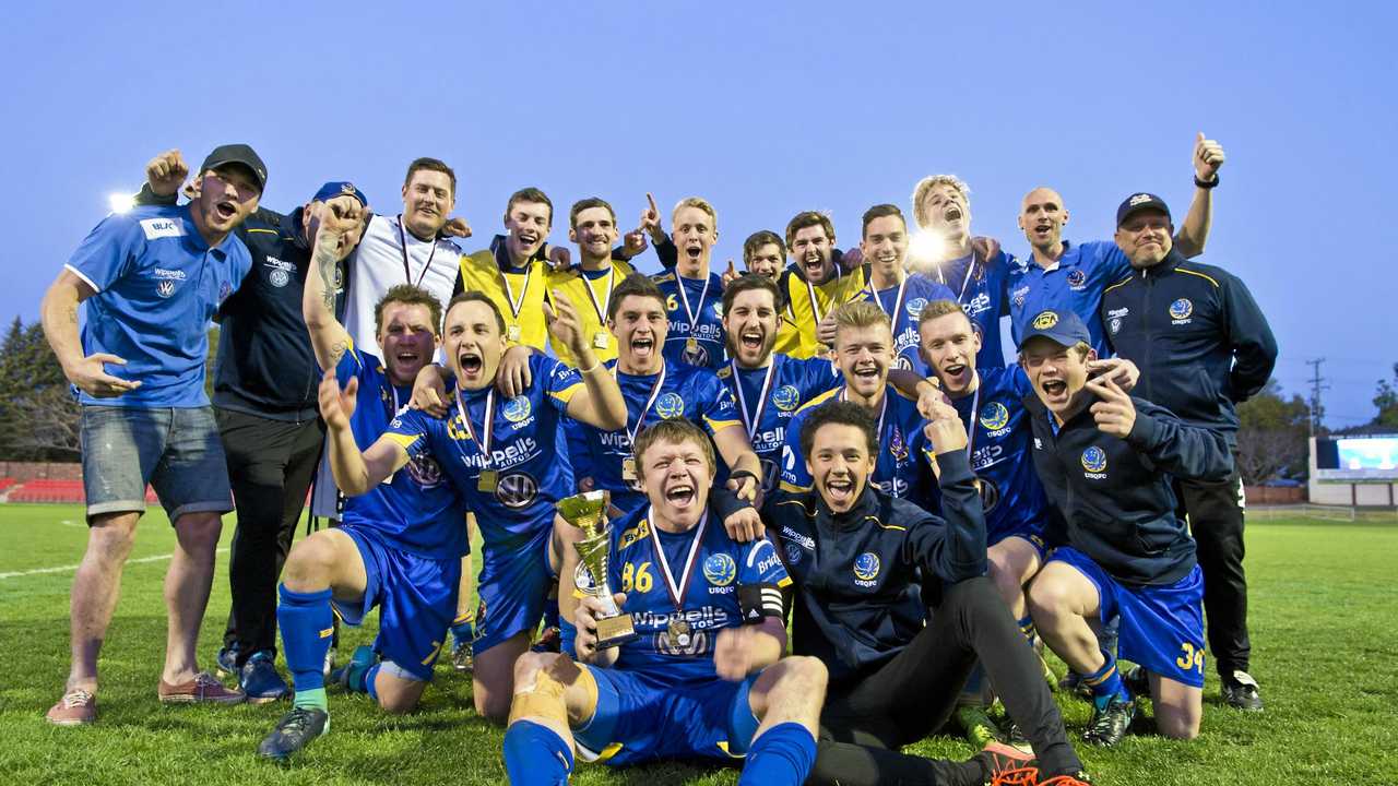 CHAMPIONS: USQ FC celebrate their Premier Men's grand final win against Willowburn at Clive Berghofer Stadium. Picture: Kevin Farmer