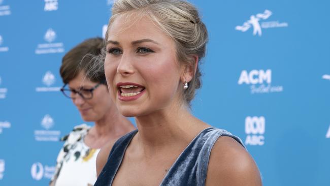 CANBERRA, AUSTRALIA - NewsWire Photos JANUARY 25, 2021: Tasmania Australian of the Year: Grace Tame, advocate for survivors of sexual assault and #LetHerSpeak campaigner arrives at the The 2021 Australian of the Year Awards ceremony at the National Arboretum, Canberra. Picture: NCA NewsWire / Martin Ollman