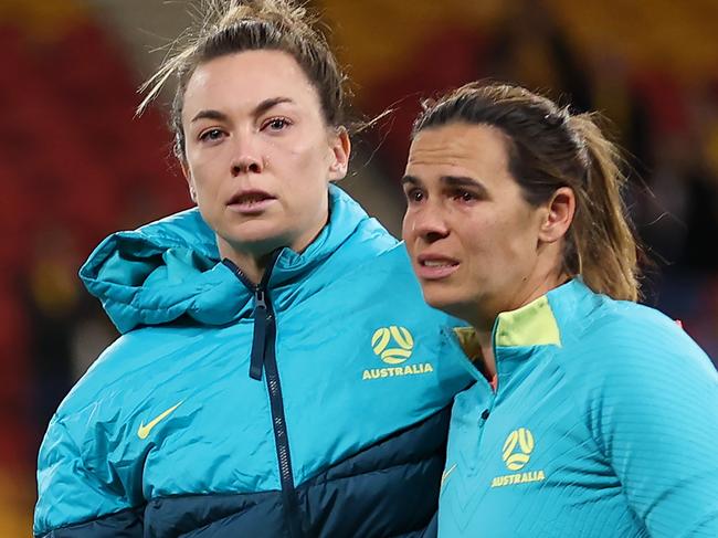 BRISBANE, AUSTRALIA - AUGUST 19: Mackenzie Arnold and Lydia Williams of Australia look dejected after the team's defeat following the FIFA Women's World Cup Australia & New Zealand 2023 Third Place Match match between Sweden and Australia at Brisbane Stadium on August 19, 2023 in Brisbane, Australia. (Photo by Cameron Spencer/Getty Images)