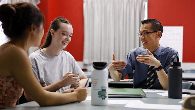 Eddie Woo, Professor of Practice in the University of Sydney’s school of education, pictured with maths teachers-in-training. Picture: Jonathan Ng