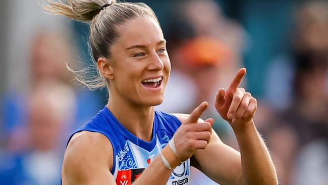 MELBOURNE, AUSTRALIA - NOVEMBER 02: Alice O'Loughlin of the Kangaroos celebrates a goal during the 2024 AFLW Round 10 match between the North Melbourne Tasmanian Kangaroos and the Gold Coast Suns at Arden Street Oval on November 02, 2024 in Melbourne, Australia. (Photo by Dylan Burns/AFL Photos via Getty Images)