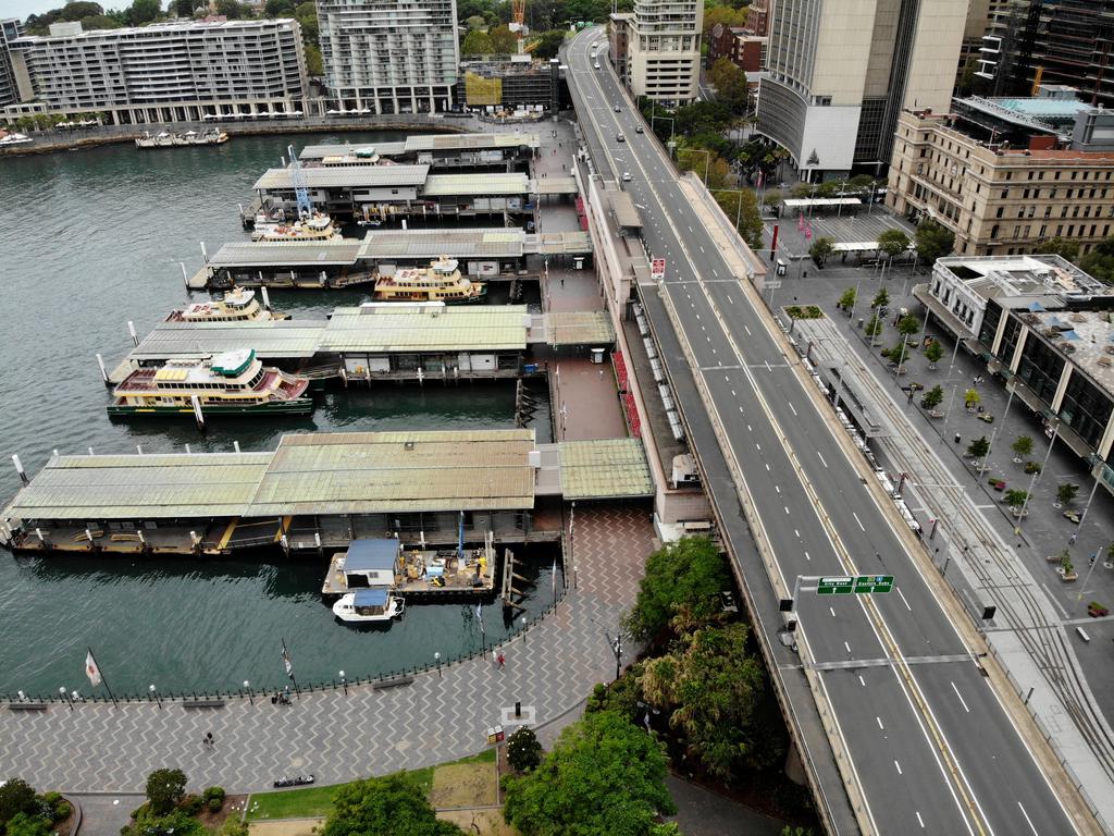 The effect of coronavirus takes affect on various places around Sydney with crowds being told not to congregate in public places. Crowds around Circular Quay have disappeared due to the virus. Picture: Toby Zerna