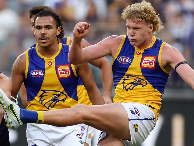 PERTH, AUSTRALIA - APRIL 02: Reuben Ginbey of the Eagles kicks the ball during the 2023 AFL Round 03 match between the Fremantle Dockers and the West Coast Eagles at Optus Stadium on April 2, 2023 in Perth, Australia. (Photo by Will Russell/AFL Photos via Getty Images)