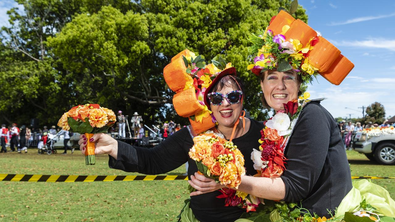 Geraldine Sevil (left) and Whitney McCarthy walked with the Grand Central float in the Grand Central Floral Parade of Carnival of Flowers 2022, Saturday, September 17, 2022. Picture: Kevin Farmer