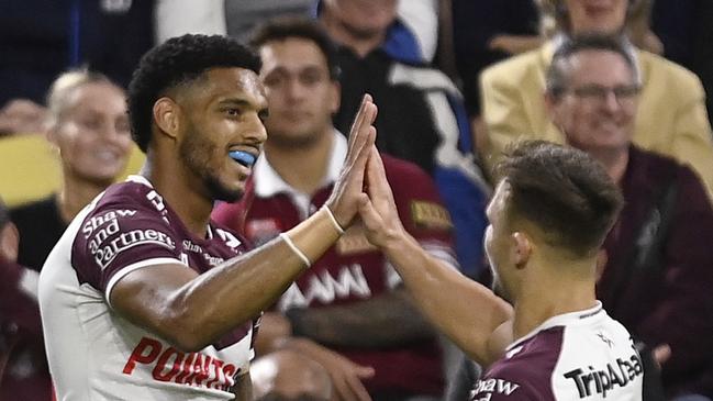 TOWNSVILLE, AUSTRALIA - JULY 06: Jason Saab of the Sea Eagles celebrates after scoring a try  during the round 18 NRL match between North Queensland Cowboys and Manly Sea Eagles at Qld Country Bank Stadium, on July 06, 2024, in Townsville, Australia. (Photo by Ian Hitchcock/Getty Images)