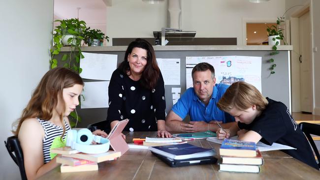 Dr. Matthew Zbaracki withi his wife Jane Plunkett and their kids Emma (11) and Oliver (12) at their home in Montmorency. Picture: Aaron Francis