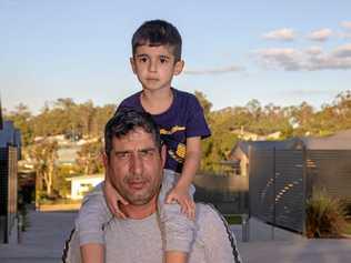 Iranian asylum seeker Shamsullah Piri and his son, Ryan. Picture: Dominic Elsome