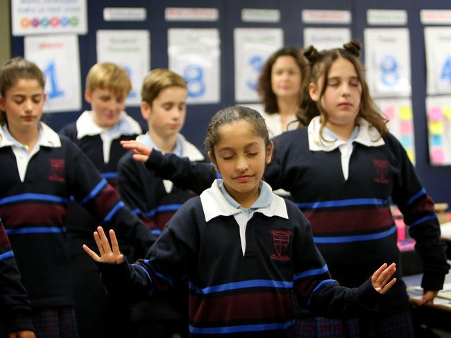 03/05/2018: Students from St Joseph's Primary School in Malvern, take part in â€œmindfulnessâ€ activities, pretending they are trees, following the release of the first curriculum designed to meet the personal and social general capabilities within the Australian schools. The launch of the curriculum, which incorporates lessons designed to aid student's social and emotional development has emerged following the release of the latest Gonski report. Stuart McEvoy for The Australian.