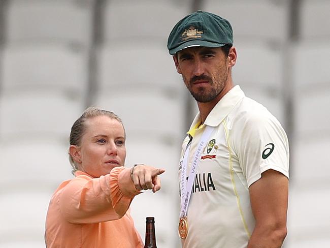 LONDON, ENGLAND - JUNE 11: Mitchell Starc of Australia and his wife and Australian Cricketer Alyssa Healy, walk on the pitch after day five of the ICC World Test Championship Final between Australia and India at The Oval on June 11, 2023 in London, England. (Photo by Ryan Pierse/Getty Images)