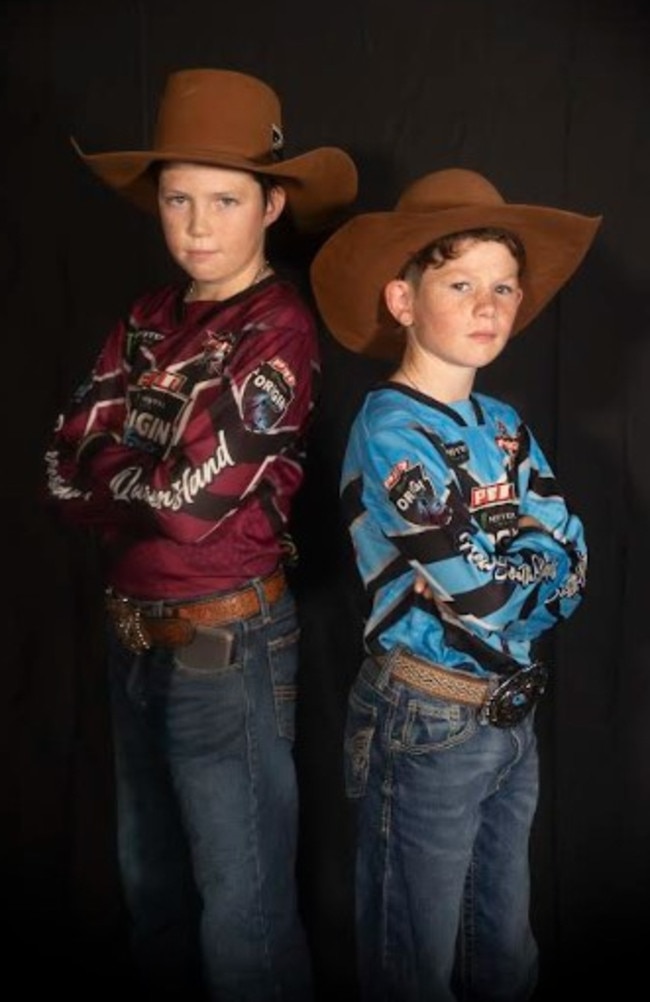 Queensland's Wylie Roots with his New South Wales rival Kassedy Carlon.