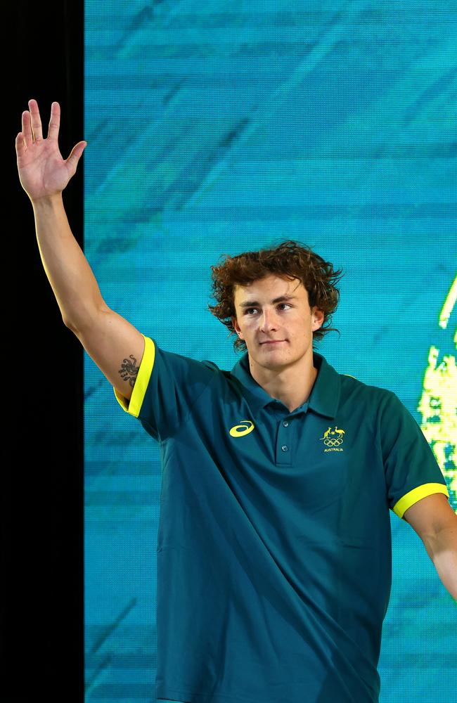 BRISBANE, AUSTRALIA – JUNE 15: Ben Armbruster waves to the crowd during the Australian 2024 Paris Olympic Games Swimming Squad Announcement at Brisbane Aquatic Centre on June 15, 2024 in Brisbane, Australia. (Photo by Quinn Rooney/Getty Images)