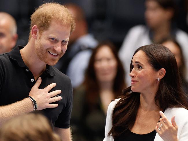 Britain's Meghan, Duchess of Sussex and Britain's Prince Harry, Duke of Sussex, attend a children's event at the 2023 Invictus Games in Duesseldorf, western Germany on September 13, 2023. The Invictus Games, an international sports competition for wounded soldiers founded by British royal Prince Harry in 2014 run from September 9 to 16, 2023 in Duesseldorf. (Photo by Odd ANDERSEN / AFP)