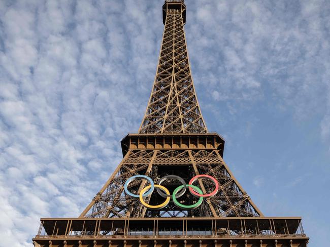 This photograph shows the Olympic rings on the Eiffel Tower in Paris on September 6, 2024. (Photo by Thibaud MORITZ / AFP)