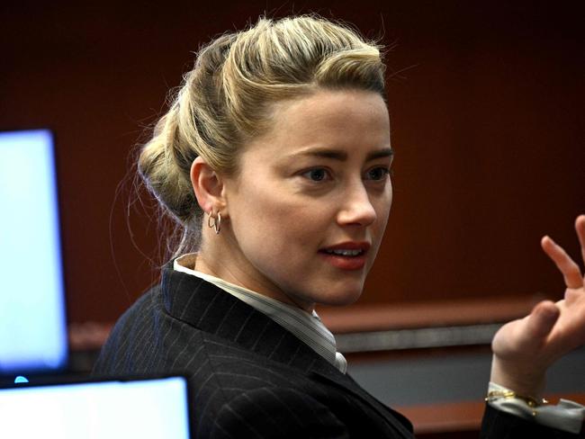 Amber Heard gestures in the courtroom at the Fairfax County Circuit Courthouse. Picture: AP