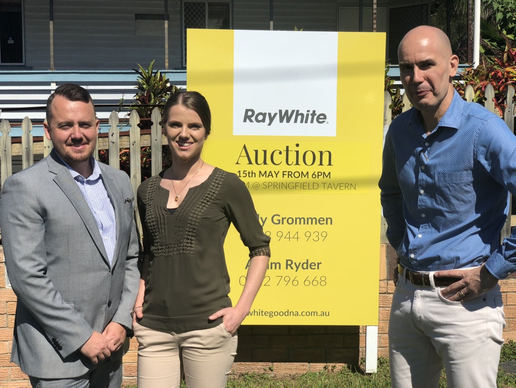 Ray White principal Rudy Grommen, sales Adam Ryder and sales associate Shannon Burchill are working to sell a Goodna home left destroyed by rogue property tenants. Picture: Hayden Johnson