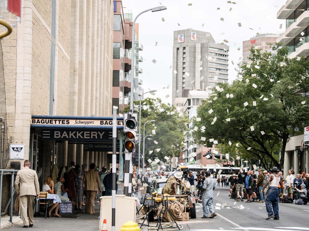 An explosion can be seen on set during the filming of “Escape from Pretoria” in Pirie St, Adelaide. Picture: Morgan Sette/The Advertiser