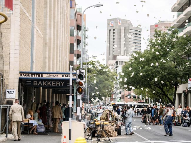 An explosion can be seen on set during the filming of “Escape from Pretoria” in Pirie St, Adelaide. Picture: Morgan Sette/The Advertiser