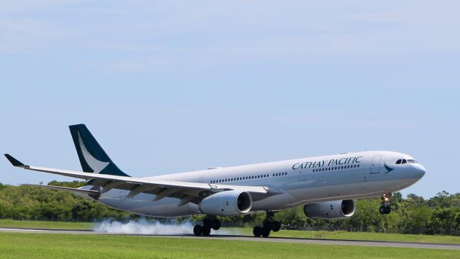 A Cathay Pacific A330 lands at Cairns Airport as part of a triweekly seasonal service linking the Far North directly with Hong Kong. Picture: Jensen Jackson