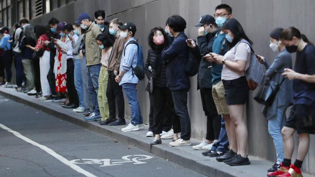 Covid testing queues for a clinic in Bourke St on Monday. Picture: David Crosling