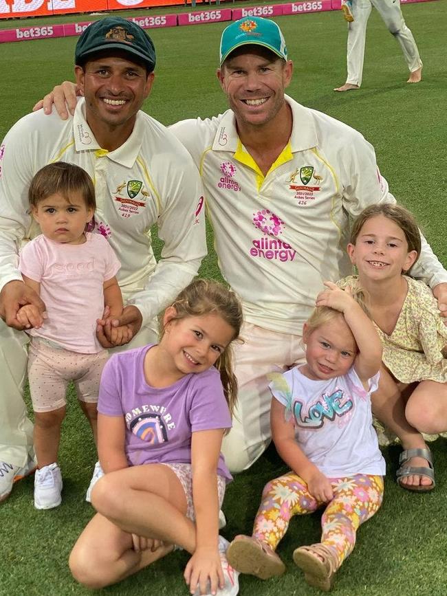 Khawaja with daughter Aisha and Dave Warner and his children after the Ashes victory last summer. Picture: Instagram