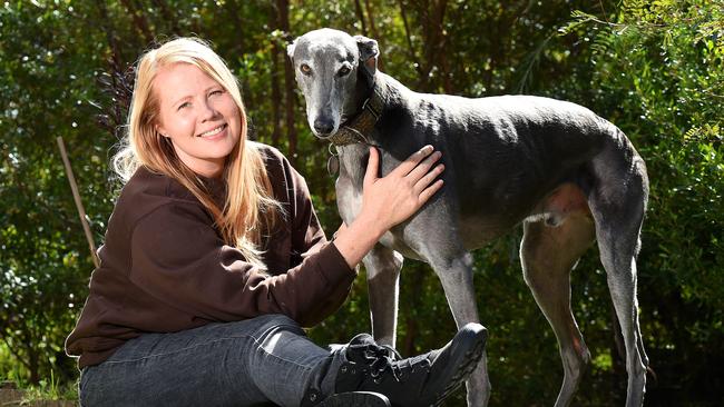 Kimberley Oxley takes her greyhound, Blue, into work every day. Picture: Josie Hayden