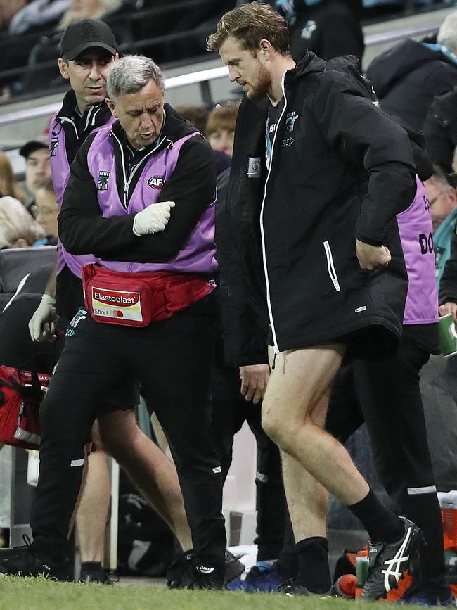 Tom Jonas walks out to the three-quarter time huddle. Picture SARAH REED