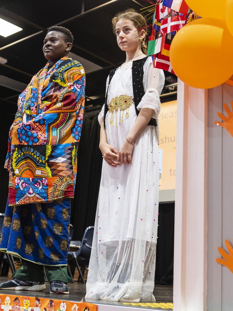 Joshua Mukeba and Ramona Hamad after sharing their stories during Harmony Day celebrations at Darling Heights State School. Picture: Kevin Farmer