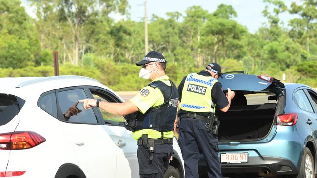 Police pull cars over to search after three men absconded from Howard Springs. Picture: Amanda Parkinson