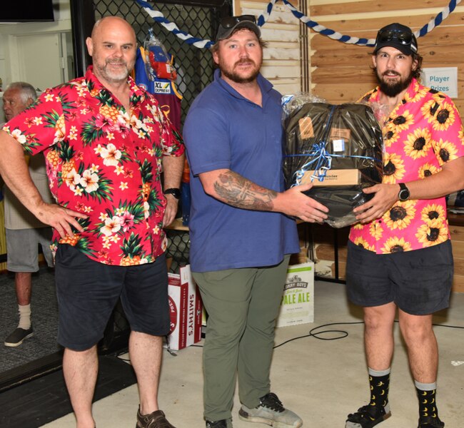 Sergeant Mark Fielding (left) and Senior Constable Rhys Bennett (right) with longest drive winner Jesse Jenkins. Picture: Supplied.