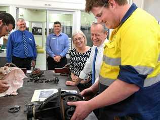 EDUCATION BOOST: Member for Bundaberg Leanne Donaldson and Opposition Leader Bill Shorten chat to third year diesel fitter Cale Harrison at Bundaberg Tafe yesterday. Picture: Mike Knott BUN091117SHORTEN1