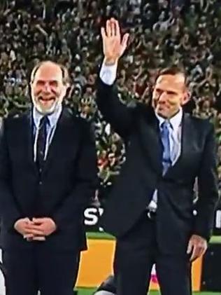 “Smile and wave”.