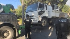 An allegedly stolen tipper truck and bobcat valued at more than $150,000 was seized in Glen Iris on December 16, 2022. Picture: Victoria Police.